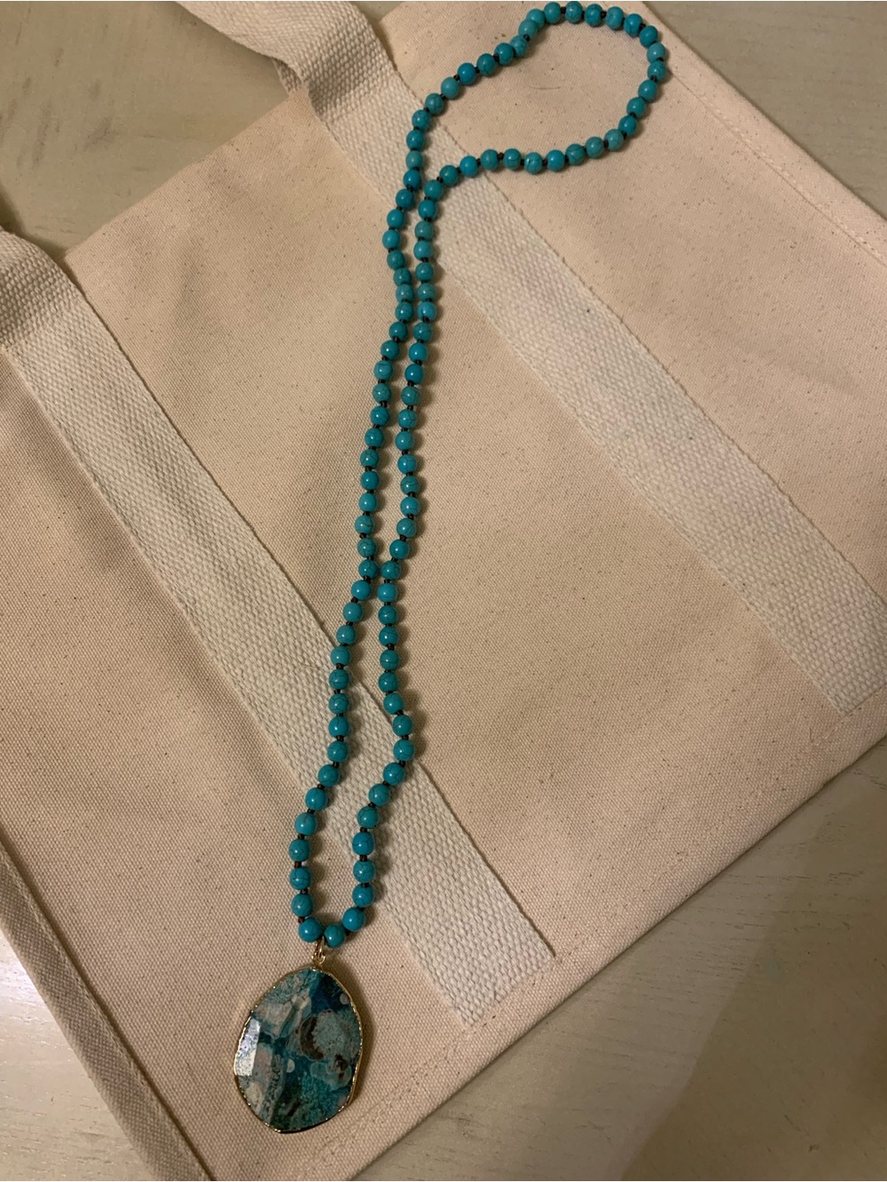 Turquoise Beaded Necklace with Multi-Tone Stone Pendant